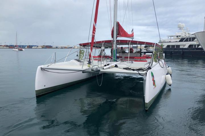 a small boat in a large body of water