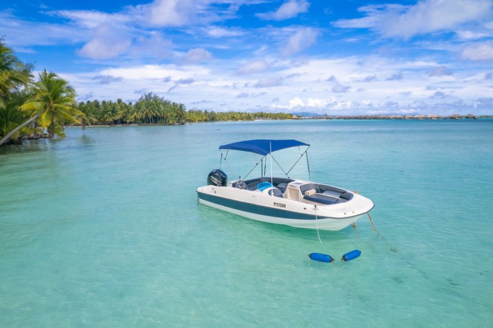 a small boat in a body of water
